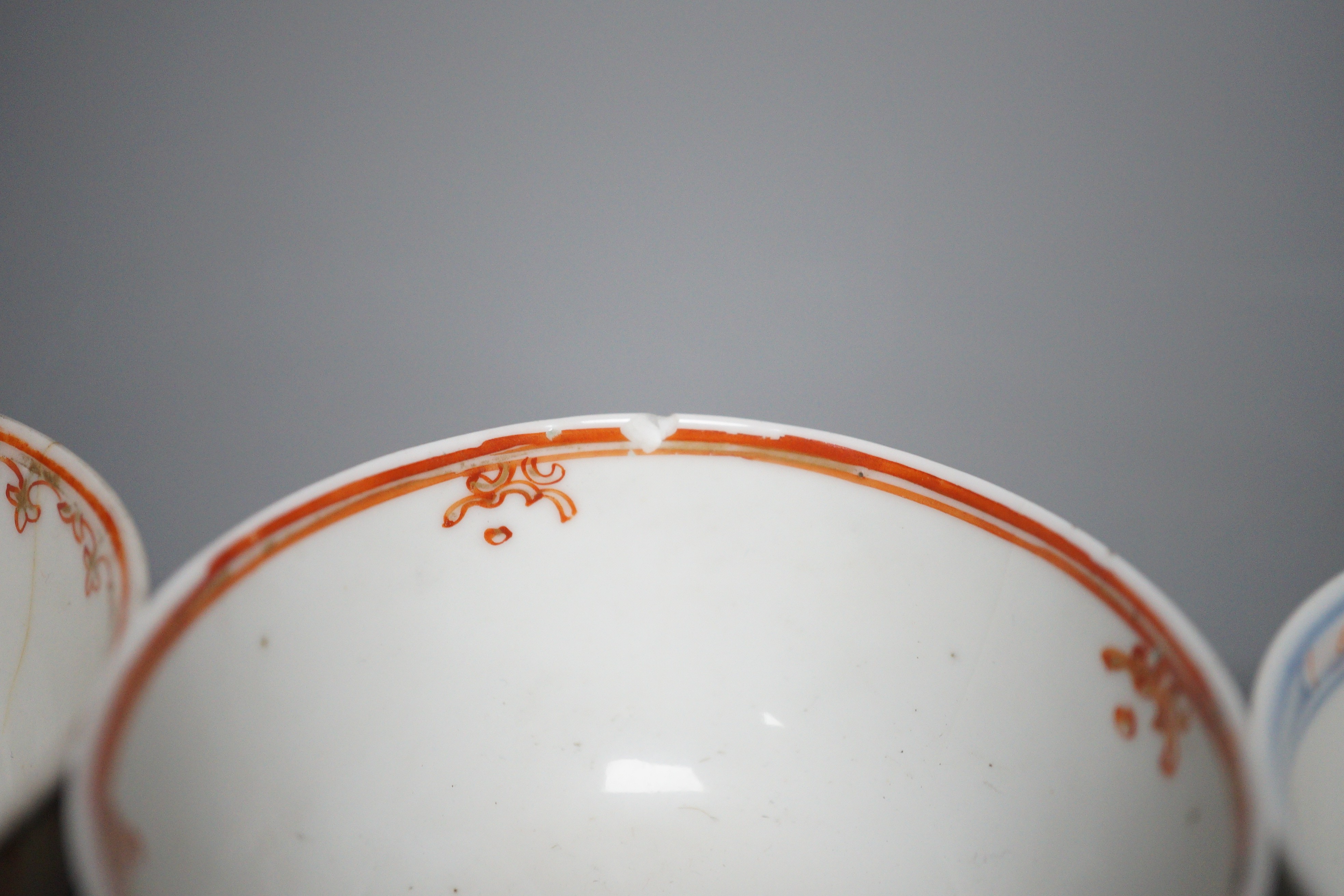 A 19th century Chinese Tobacco Leaf pattern saucer and four various teabowls